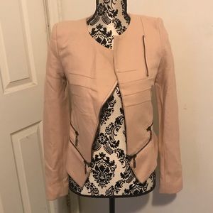 Pink jacket with zippers